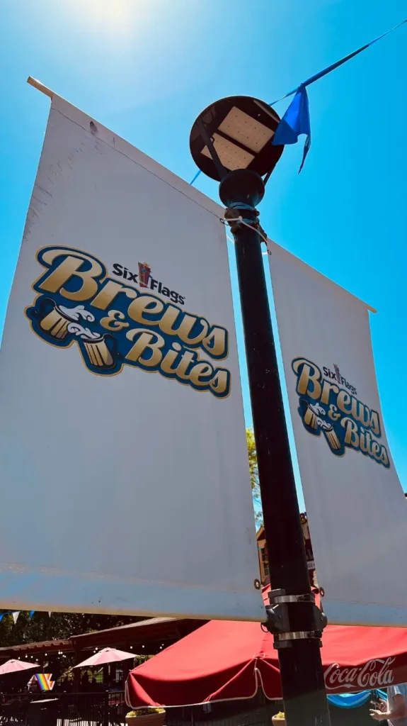 Lamp post banners for Brews & Bites food festival at Six Flags Over Georgia