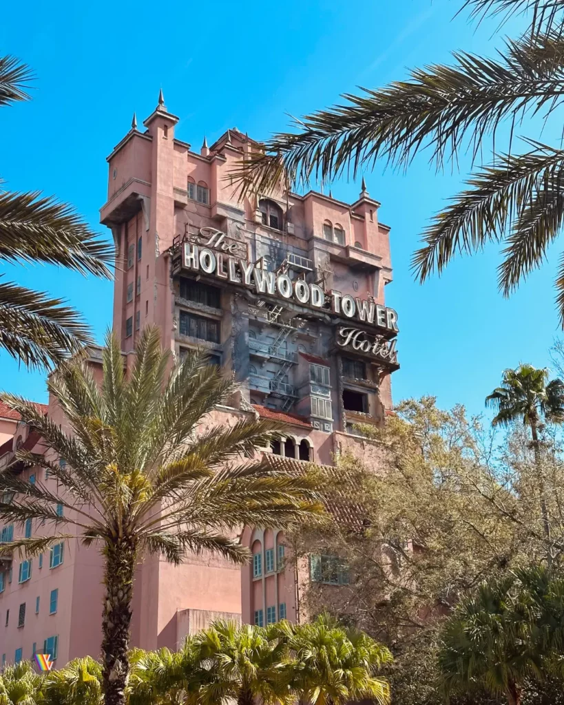 Tower of Terror behind palm trees on a sunny day at Disney's Hollywood Studios