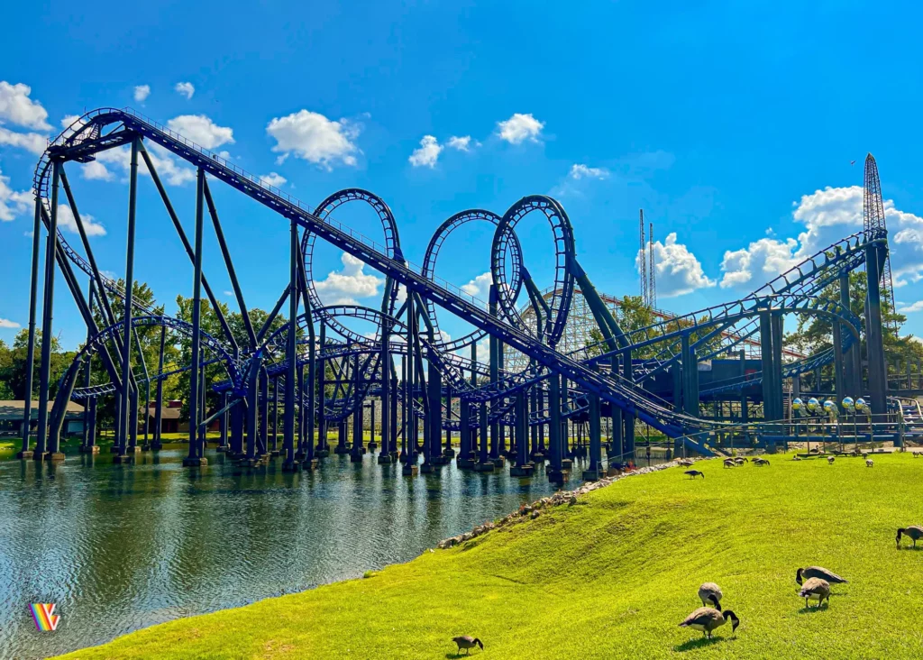 Blue Hawk roller coaster seen from across the lake at Six Flags Over Georgia