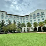 Looking at Hard Rock Hotel Orlando across small lawn of grass