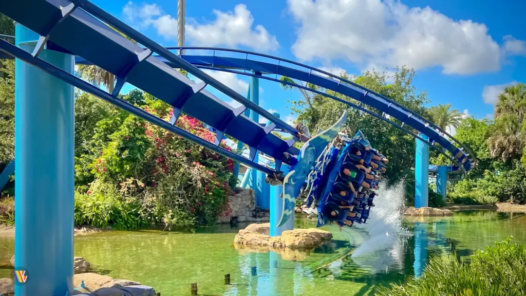 Manta roller coaster flying over water as it shoots away from train at SeaWorld Orlando