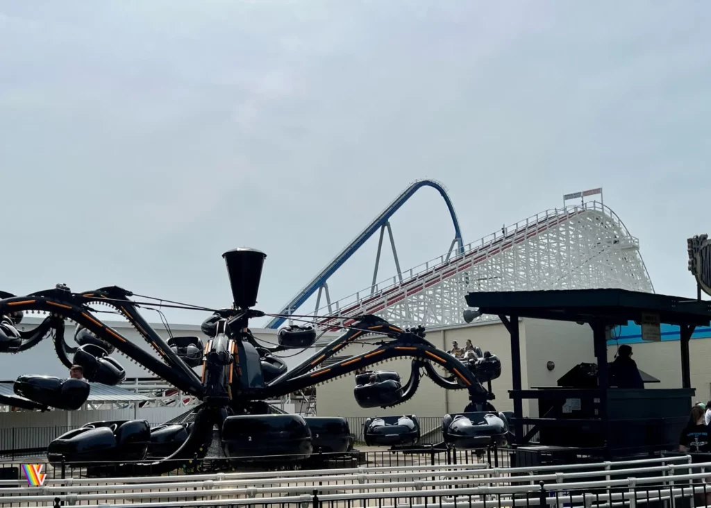 Spider ride and Orion and Racer roller coasters at Kings Island in the background