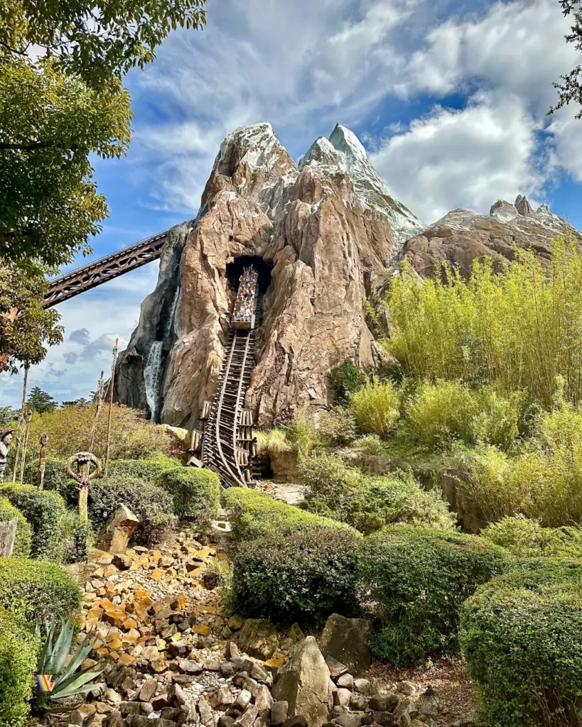 Expedition Everest coming out of the mountain into its big drop at Disney's Animal Kingdom at Walt Disney World