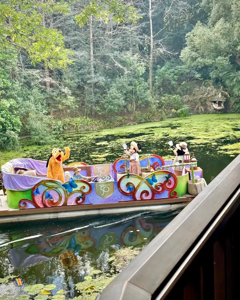 Goofy, Mickey, and Minnie on a boat at Disney's Animal Kingdom at Walt Disney World