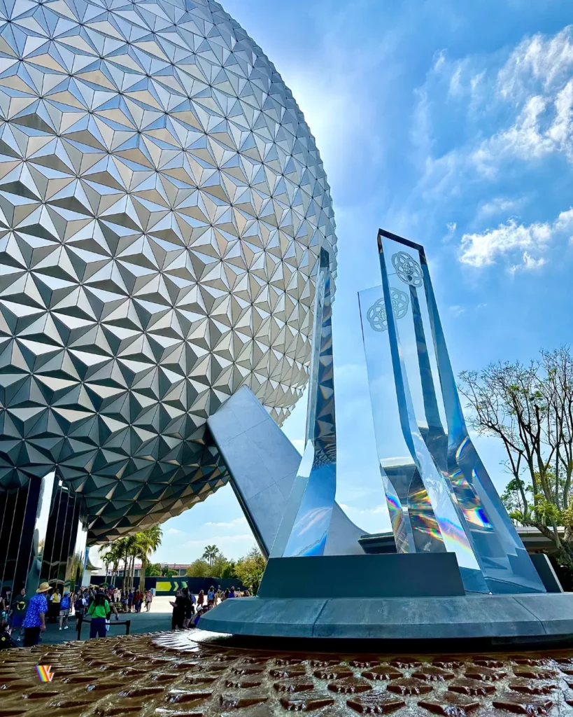 Spaceship Earth with fountain in front of it during daytime at EPCOT at Walt Disney World